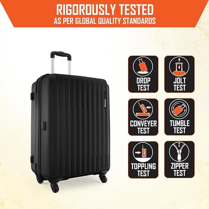 Close-up of a blue suitcase with FlowMotion 8-wheel spinner system, highlighting ultra-quiet 360° wheels designed for smooth movement on gravel, cement, stone tiles, and carpets, with text stating “Tough enough